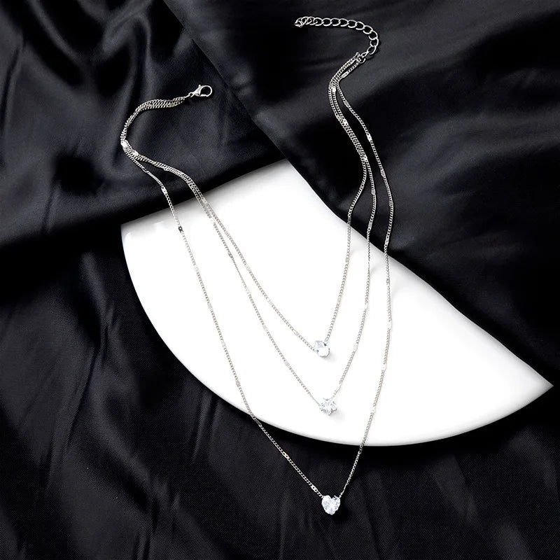 Ensemble de Colliers à Pendentifs en Cristal Zircon