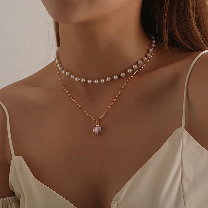 Ensemble de Colliers à Pendentifs en Cristal Zircon