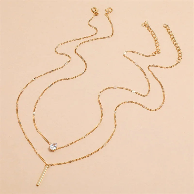 Ensemble de Colliers à Pendentifs en Cristal Zircon