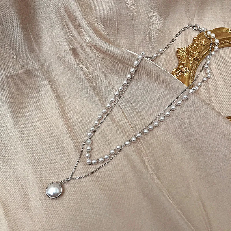 Ensemble de Colliers à Pendentifs en Cristal Zircon
